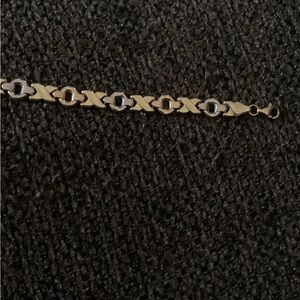 14k yellow,white and rose gold braclet.